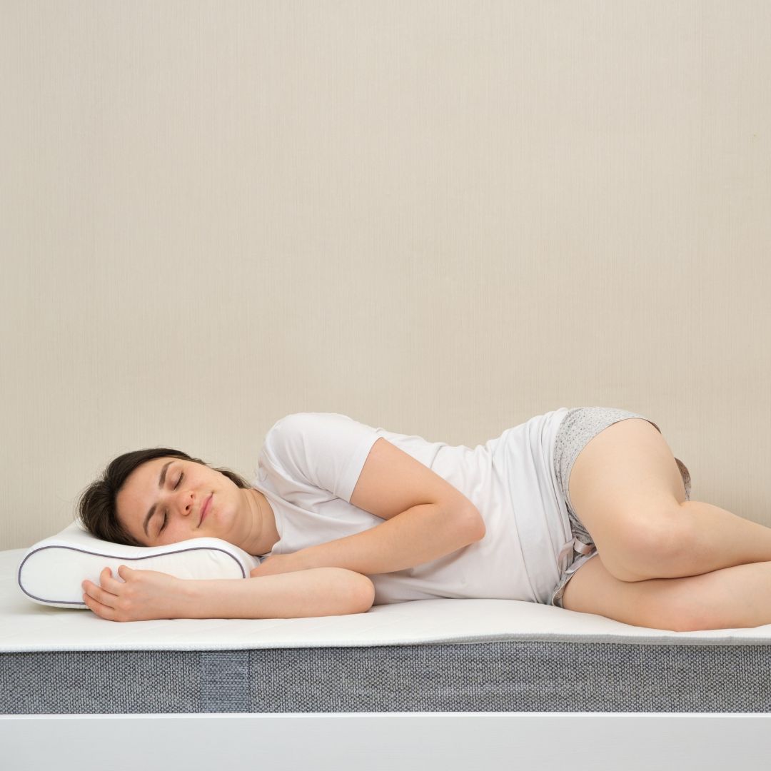 Woman sleeping on memory foam mattress